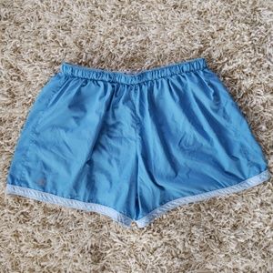New Balance light blue running shorts